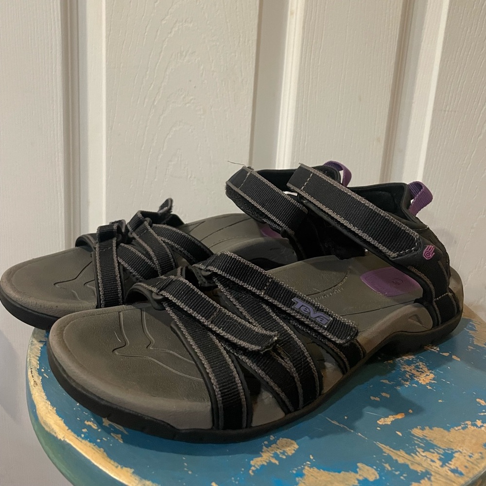 Black Teva sandals. Great for hiking or water.  Perfect for travel. Comfy